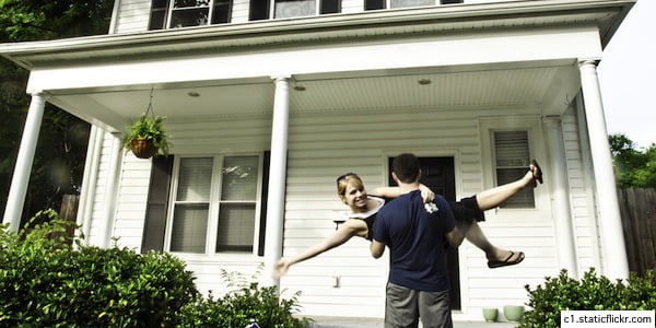 person being carried into house